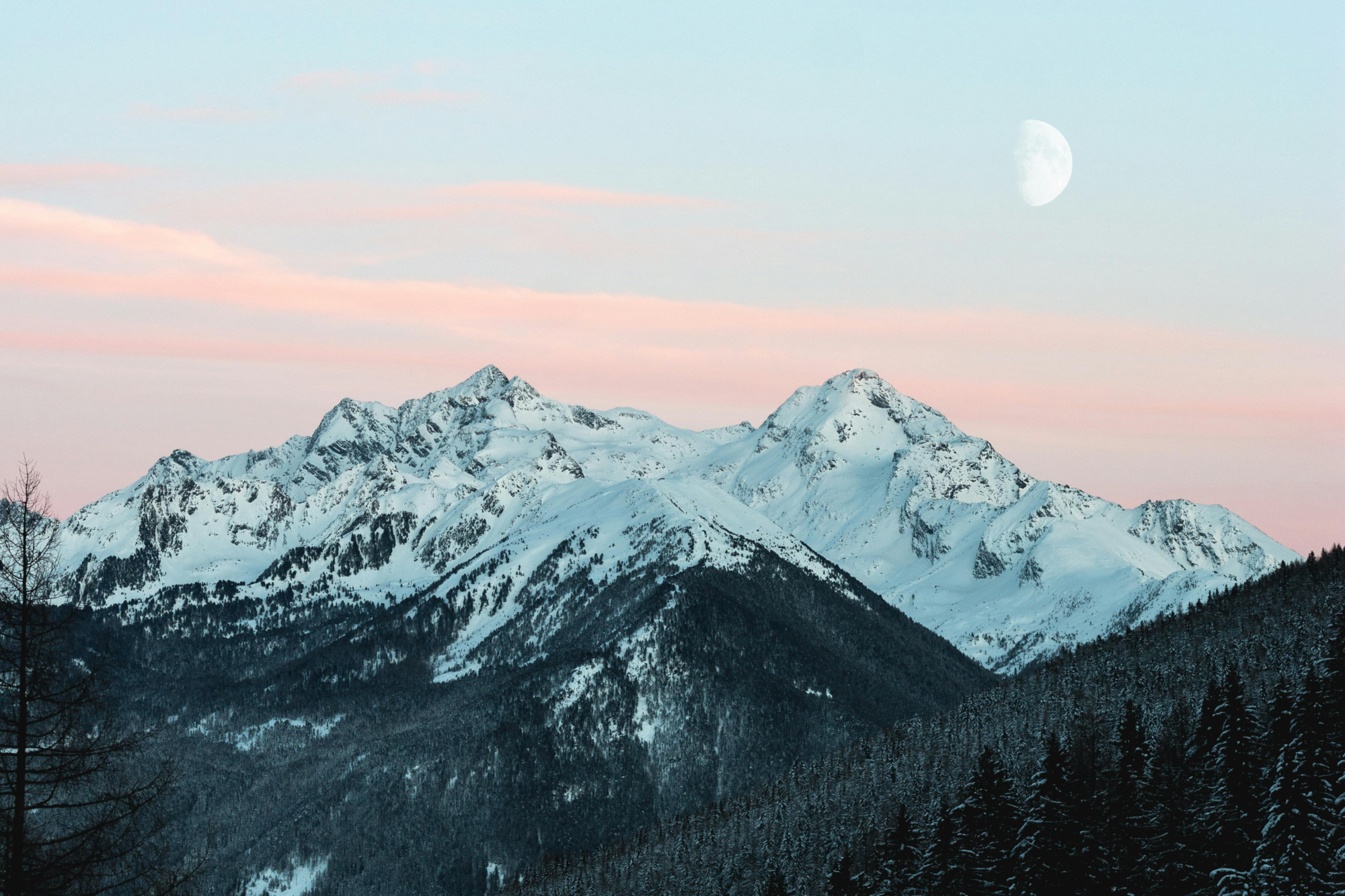 Snowy mountain tops with moon